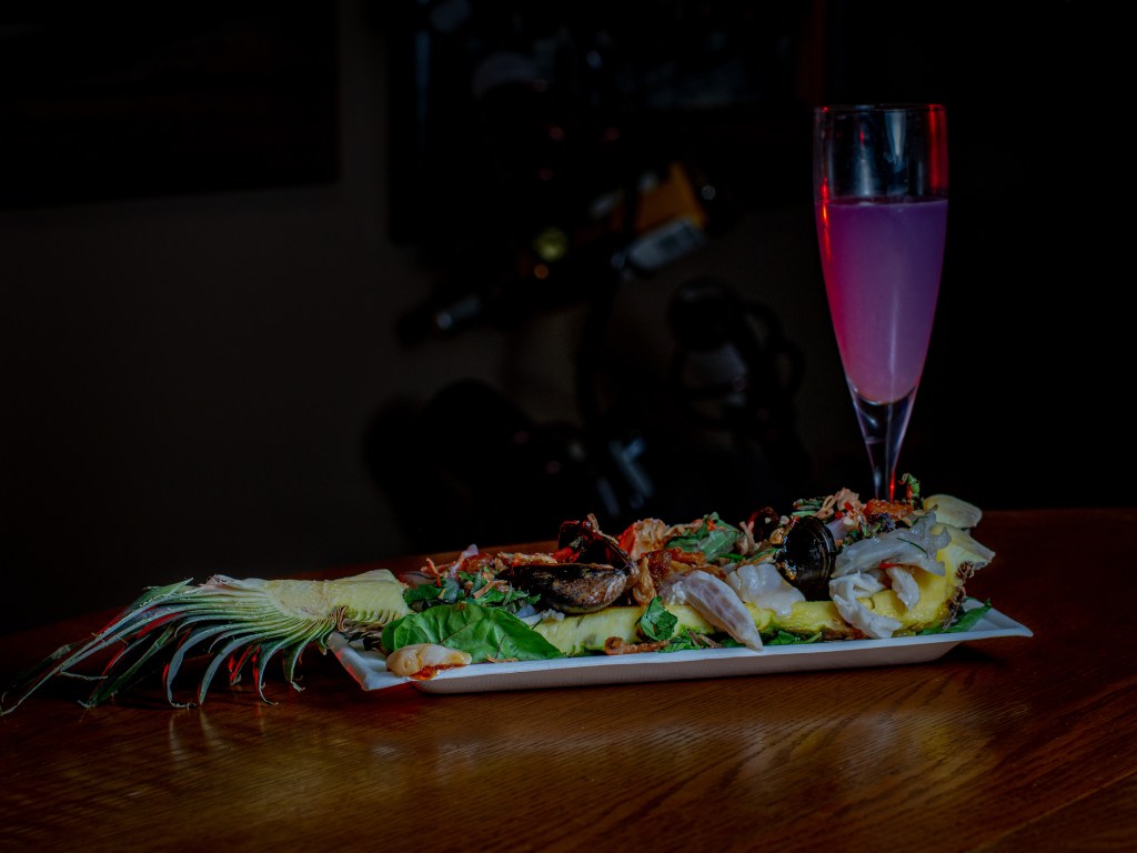 Marinated seafood on pineapple